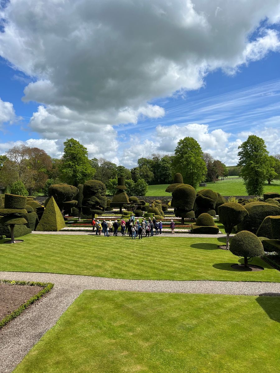 A tour taking part at Levens Hall and Gardens, Cumbria, on World Topiary Day 2022