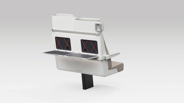 Rear view of pair of ALIZÉ seats with both tables open and arms down 