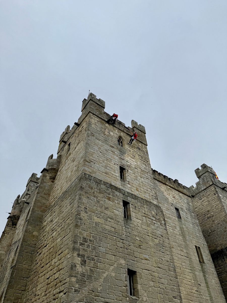Bold knights scale Langley Castle's walls