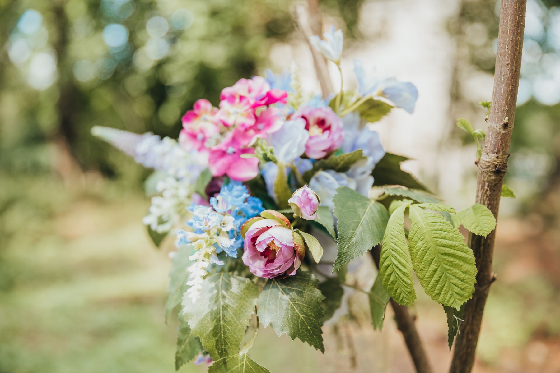 Floral feature at a woodland wedding at Langley Castle Hotel, Northumberland