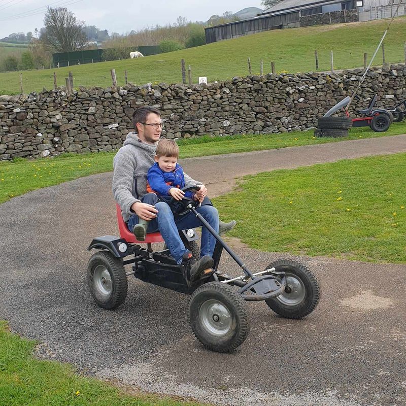 Visitors karting at the Lakeland Maze Farm Park near Kendal