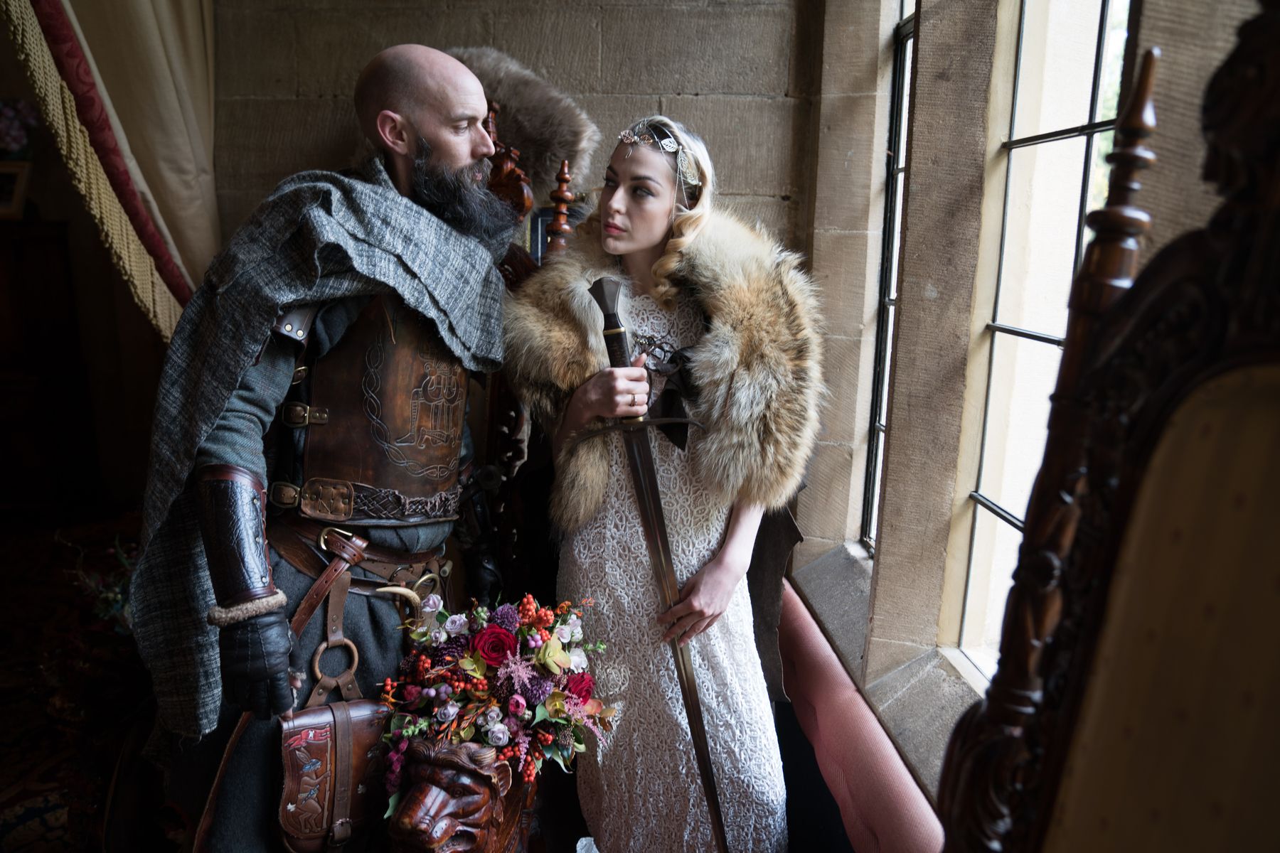 Couple at the drawing room window at Langley Castle Hotel