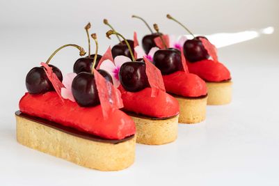 Cherry on Top of the Cake, elegant poppy seeds and almond cream tartlet,  on top a light cherry cream.