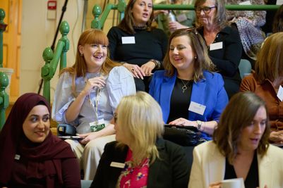 Attendees enjoying Gardner Leader's International Women's Day event