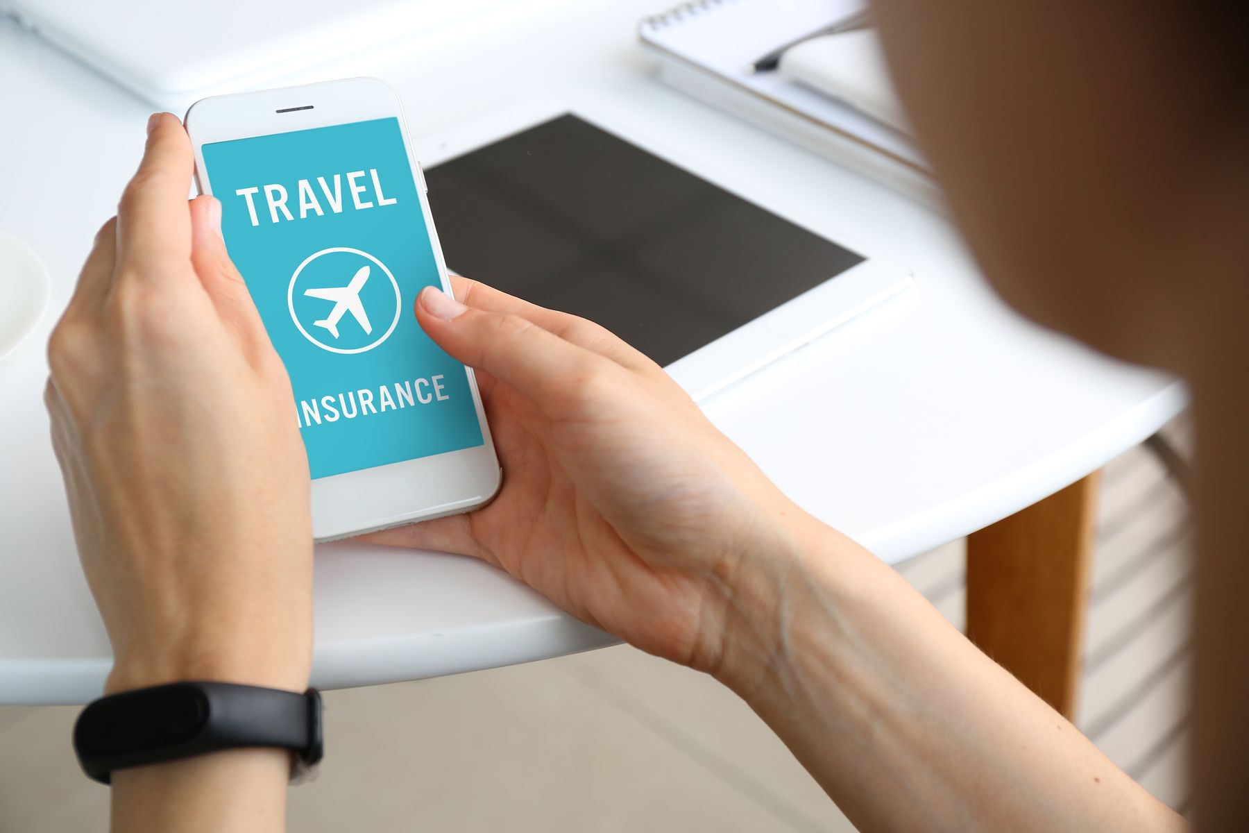 Travel insurance icon on mobile screen
