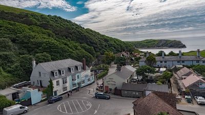 Hall and Woodhouse Lulworth Cove View.jpg