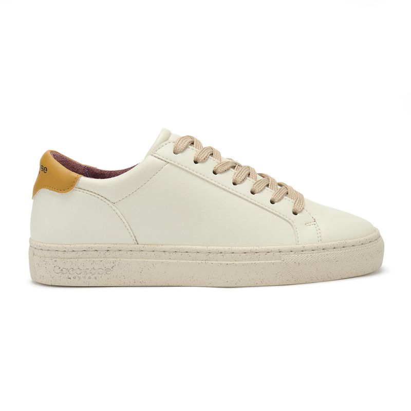 Plant-powered 'Kew' vegan trainer from Cocorose London, in white with Mostaza heel tab,