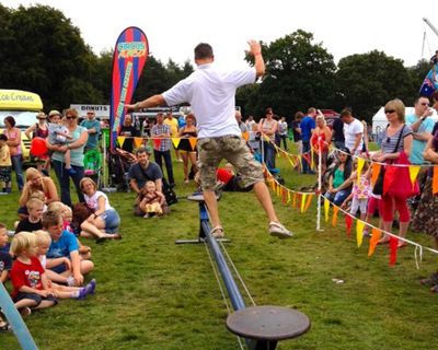Man taking part in a Circus Avago circus workshop