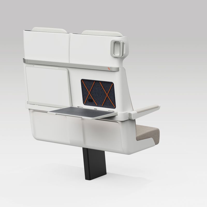 Rear view of ALIZÉ seat with one table open