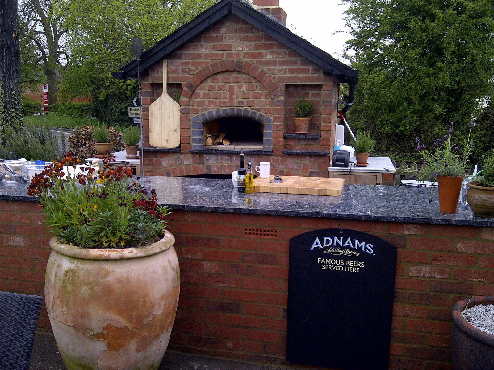A Valoriani commercial woodfired pizza oven in a pub garden environment 