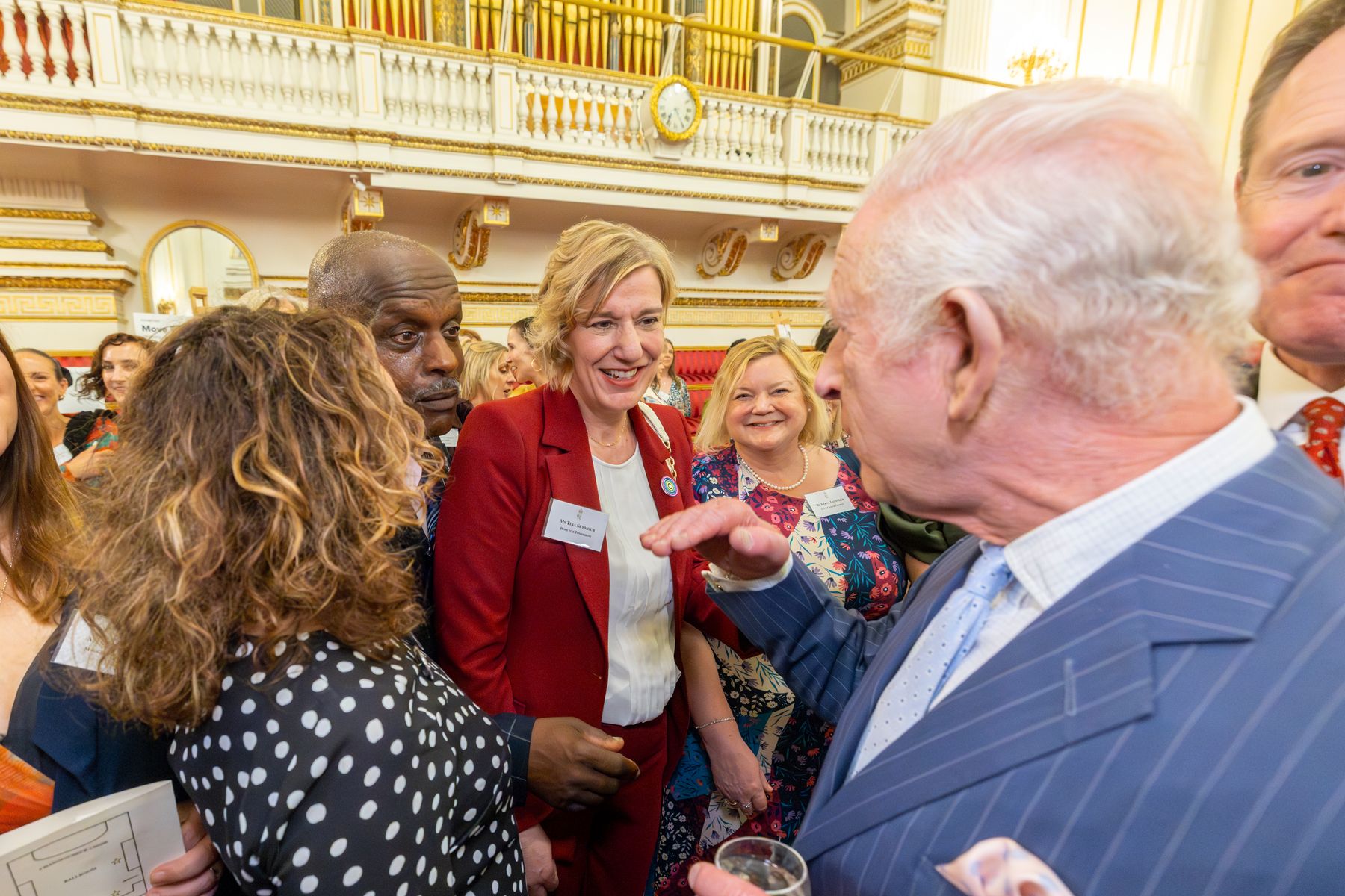  CEO Tina Seymour (centre) meeting HM The King