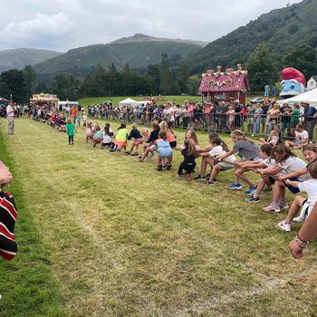 A fun children's tug of war taking place at Grasmere Lakeland Sports and Show