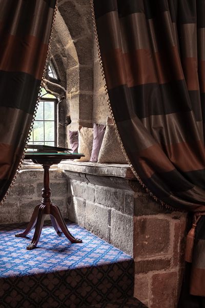 Window seat in bedroom at Langley Castle Hotel, Northumberland, UK