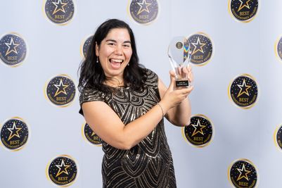 Janan Leo, founder of Cocorose London, with her Gold Award for Best Customer Service, won at the national Best Businesswomen Awards 2024