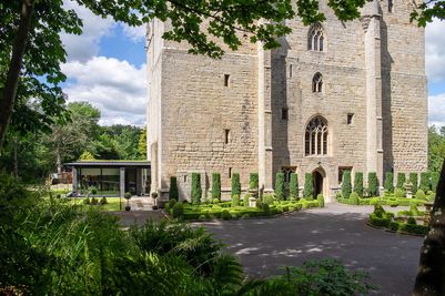 View from the trees surrounding the car park at Langley Castle Hotel, Northumberland,