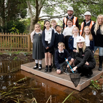 Pupils from Sutton Park School with Louis Smith and Russ Hulse from McPhillips, Councillor Tracey Onslow and Emily Myatt also from McPhillips.jpg