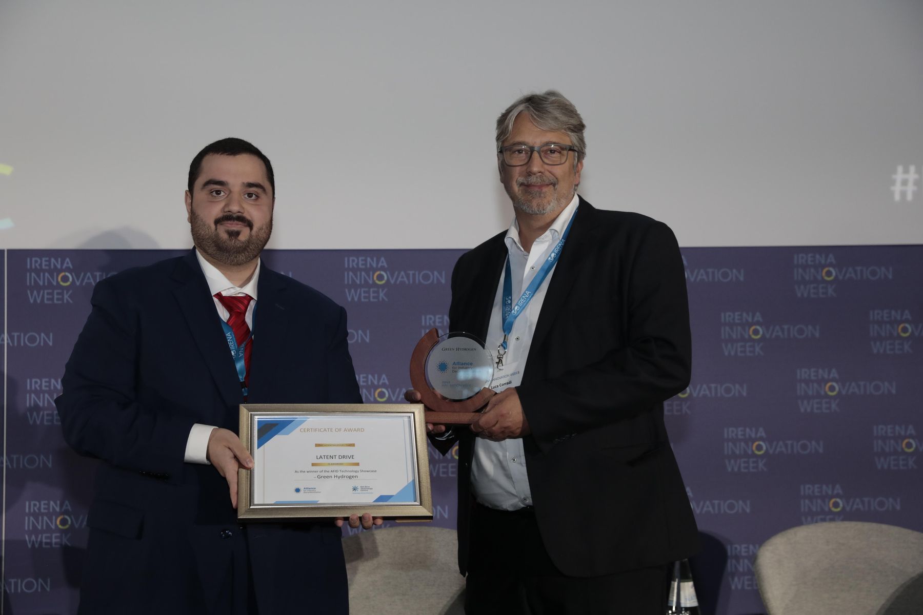 Latent Drive_AFID-IRENA award_Luca Corradi (right)_Dr. Nawal Al-Hosany (left).jpg