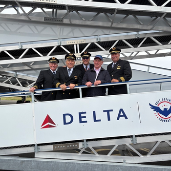 Graham Corfield with the Delta Air Lines pilots.jpeg