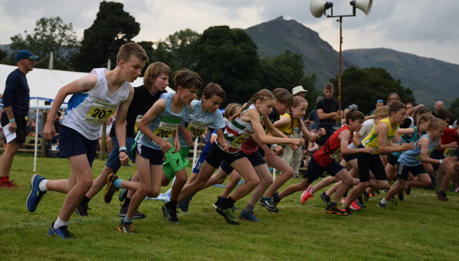 Young fell runners at the start of a race in 2022 at Grasmere Lakeland Sports and Show.