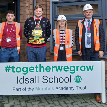 Pic caption (L-R) - McPhillips apprentice Ollie Fudge, Idsall School Head of Construction Graham Northall, McPhillips social value co-ordinator Emily Myatt and McPhillips procurement manager Roger Cox.jpg