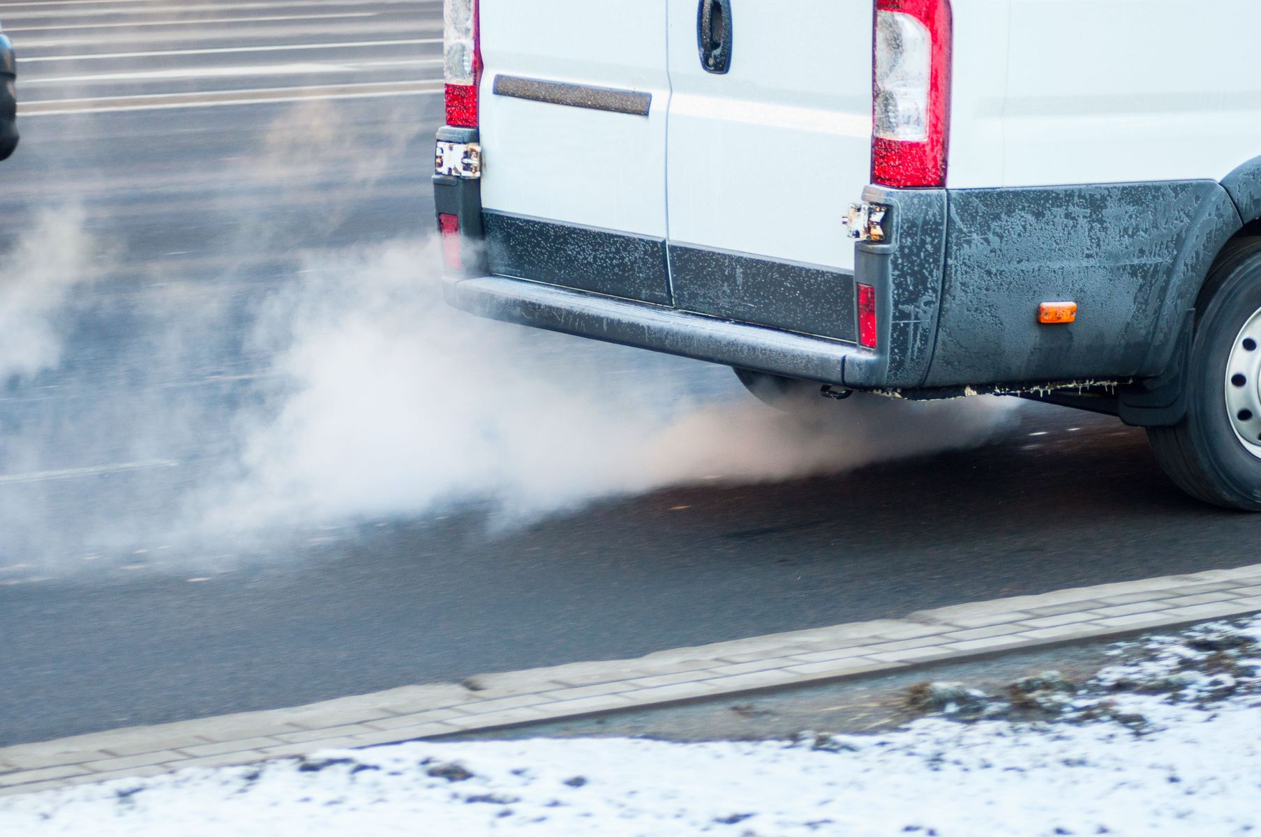 Van emitting exhaust fumes