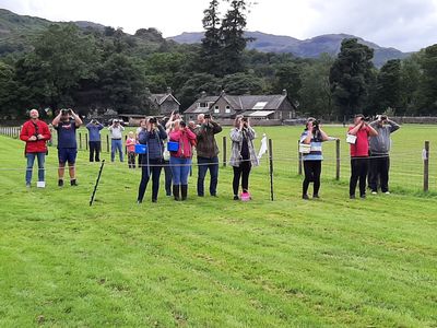 Owners await the return of their dog from a hound trail race at Grasmere Sports Show Ground