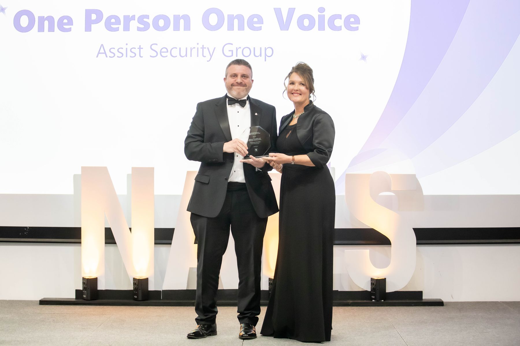 Paul Grzegorzek, Account Director at Assist Security Group; Claire Humble, Event Host