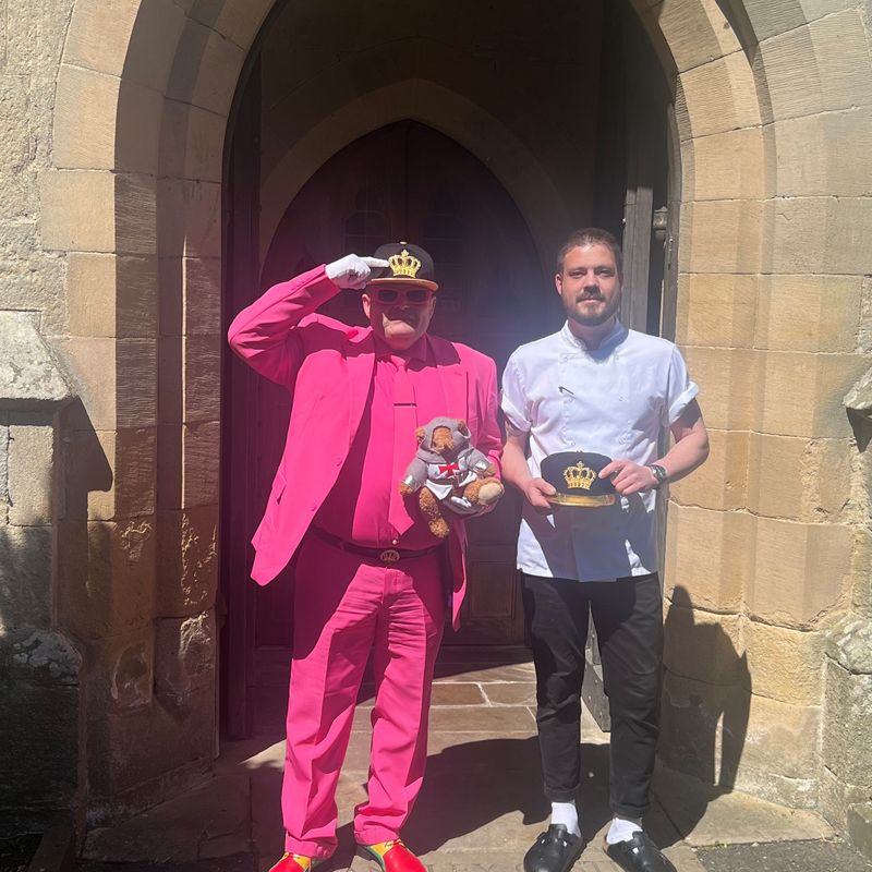 Mr Karoly Toth at Langley Castle, holding Langley Bear and with chef, Adam Phillips