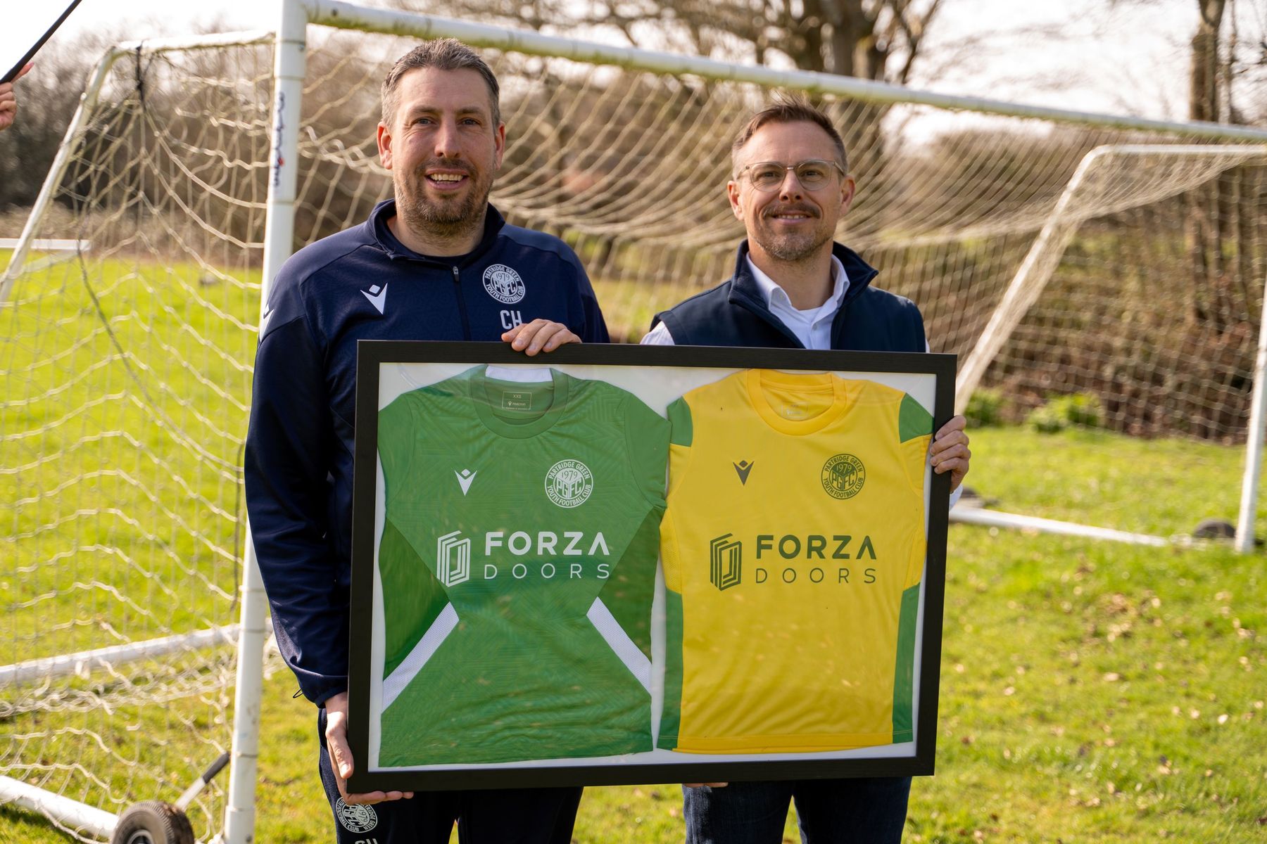 Chris Holland (left) and Will Hunnam (right) with Forza Doors-sponsored kit.