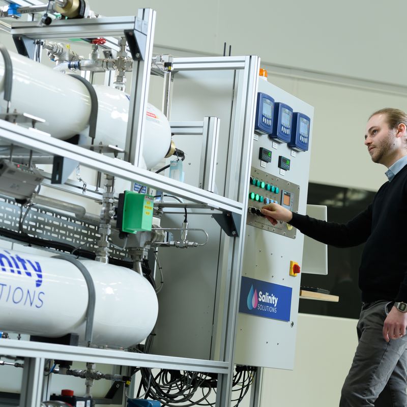 Tim Naughton, co-founder and Chief Technical Officer, Salinity Solutions, demonstrating the company's water treatment technology. 