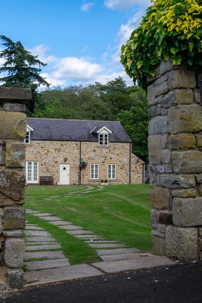 Pathway to the Castle View accommodation at Langley Castle Hotel, Northumberland