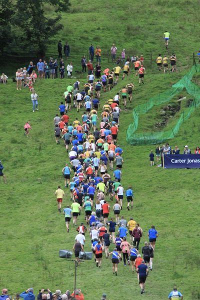 Seniors Guide Race competitors running up the fell at the 2023 Grasmere Lakeland Sports and Show