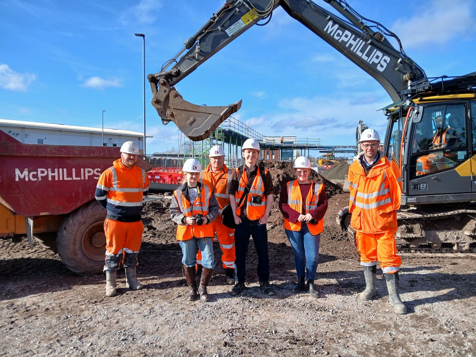 Pic Caption - Hereford College of Arts students Leah Jackson, Joe Brooks and Grace Still, pictured on site at Hereford ‘s new Transport Hub with Jordan Latchford, Shaun Williams, Richard Flanigan and Dave Williams.jpg