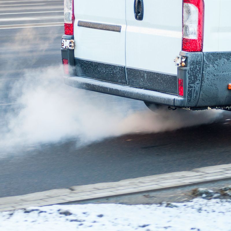 Van emitting exhaust fumes