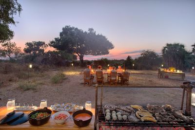 P_Asilia Lodges & Camps_Tanzania_Dar Es Salaam_Roho Ya Selous_Interiors_Exteriors_Sunset barbecue.jpg