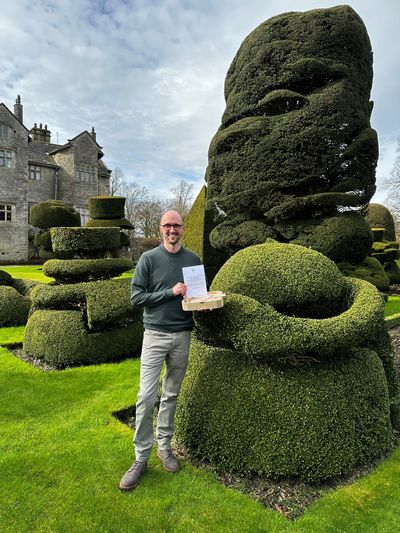 Levens Hall and Gardens owner, Richard Bagot, with the Topiary Message in a Bottle