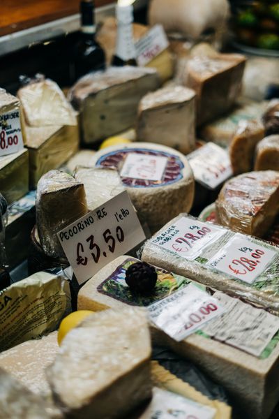 Italian cheeses waiting to be bought and used in experimental pizza toppings perhaps.