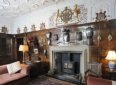 Fireplace at Elizabethan Levens Hall and Gardens, located close to Kendal in the Lake District, Cumbria.