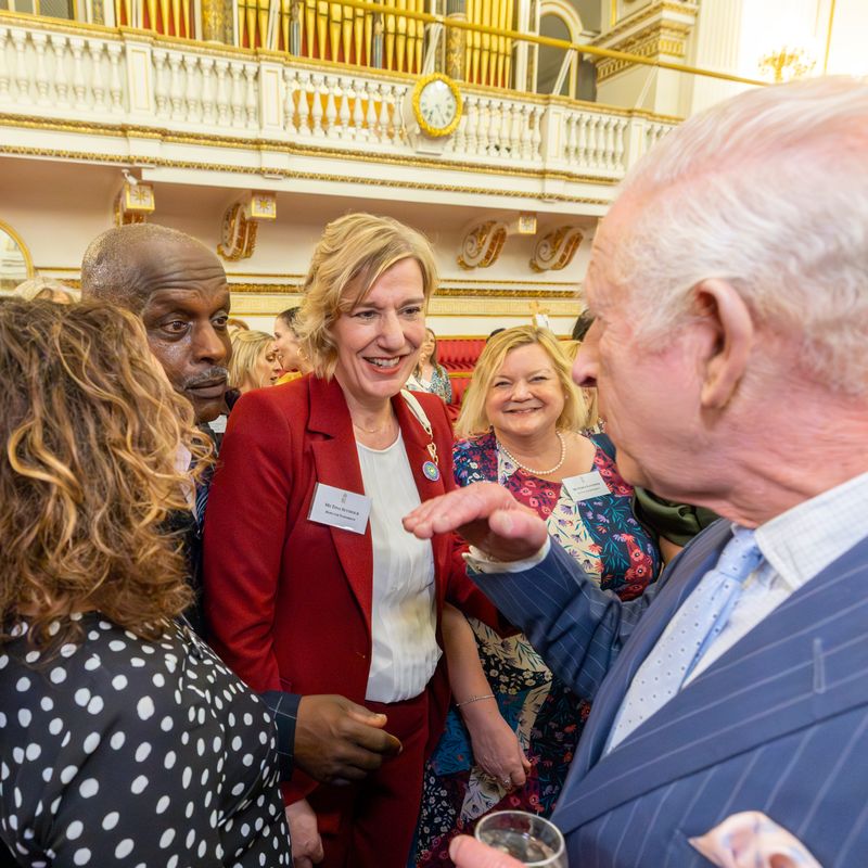  CEO Tina Seymour (centre) meeting HM The King