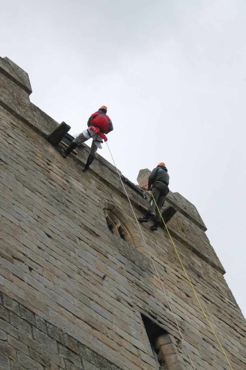Bold knights scale Langley Castle's walls, 