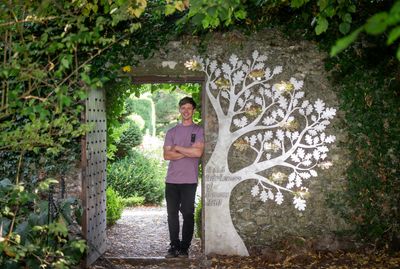 Tom Vickers the designer and creator of the head gardeners' commemorative tree sculpture at Levens Hall and Gardens, Lake District, UK