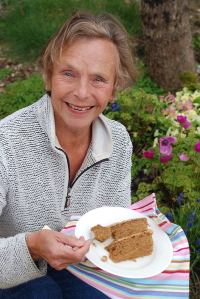 Lifestyle image of woman eating vegan cake