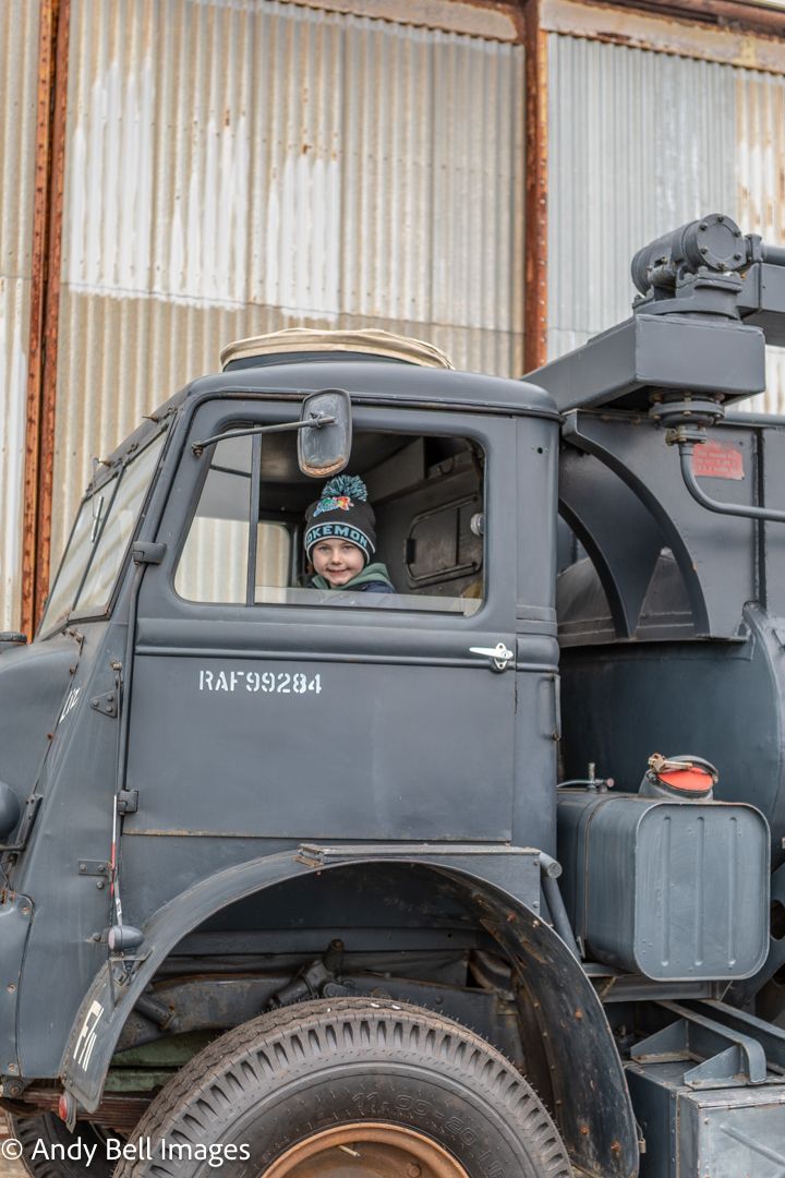 Child in wartime truck at the Spitfire Visitor Centre: Hangar 42, Blackpool