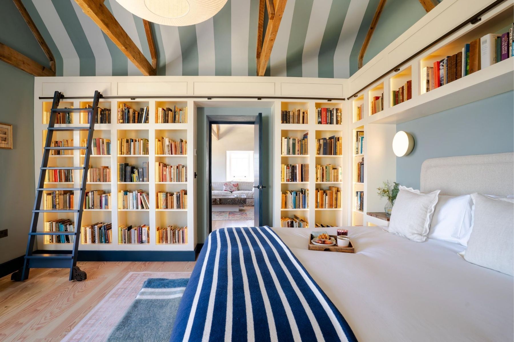 Perfect-Stays-Wharf-House-master-bedroom-library.jpg