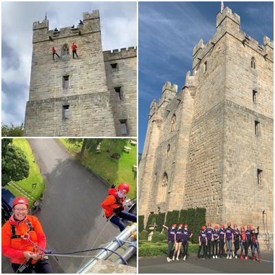 Abseilers at Langley Castle Hotel, Northumberland