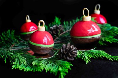 Christmas baubles, a raspberry mousse on a decadent brownie