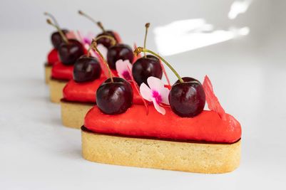Cherry on Top of the Cake, elegant poppy seeds and almond cream tartlet,  on top a light cherry cream.