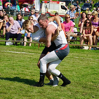 Men compete in the Cumberland & Westmorland wrestling at Grasmere Sports and Lakeland Show