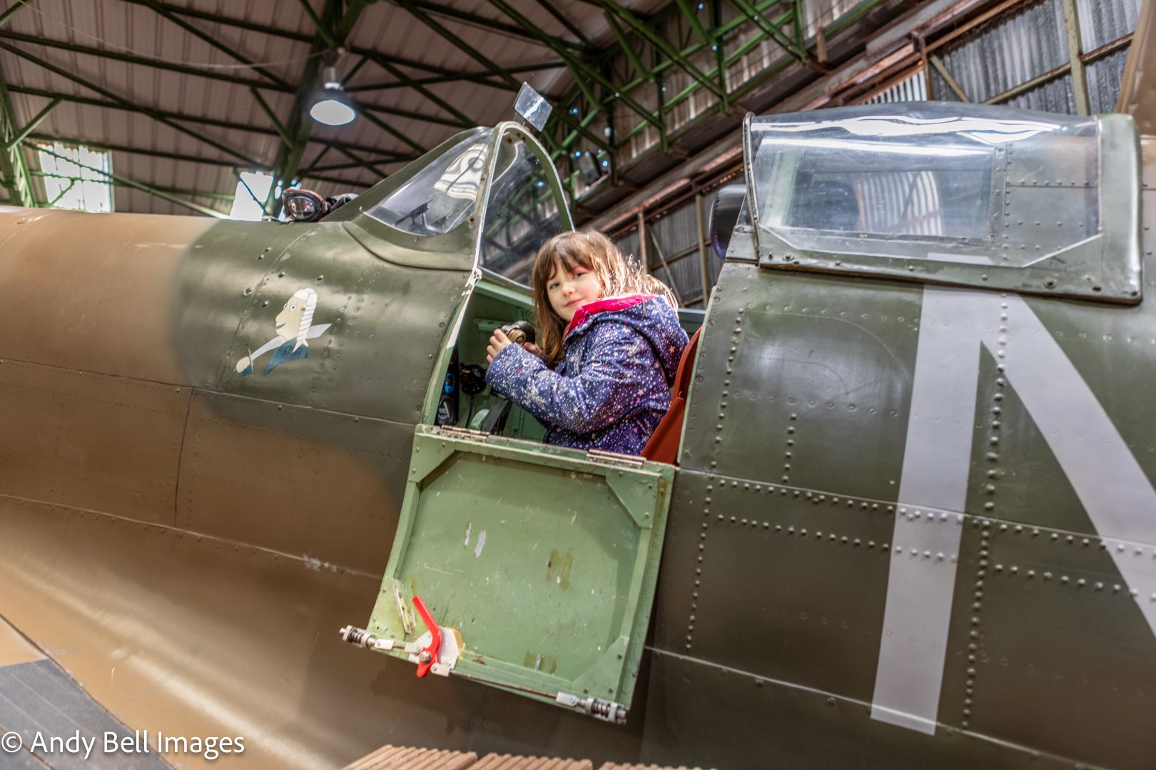 Child in the cockpit at the Spitfire Visitor Centre: Hangar 42, Blackpool