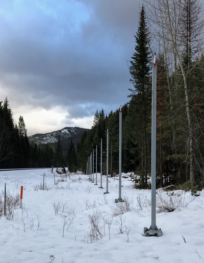 Long-life battery-powered RCM tilt and position sensors attached to vertical posts.png